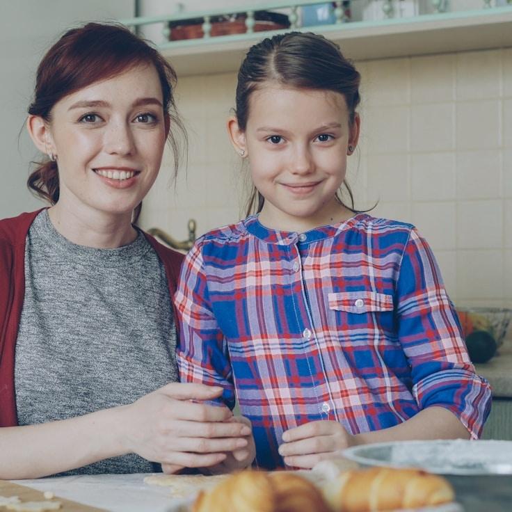 Sora Chen, Client Relations Director, discussing corporate gifting strategy with business clients